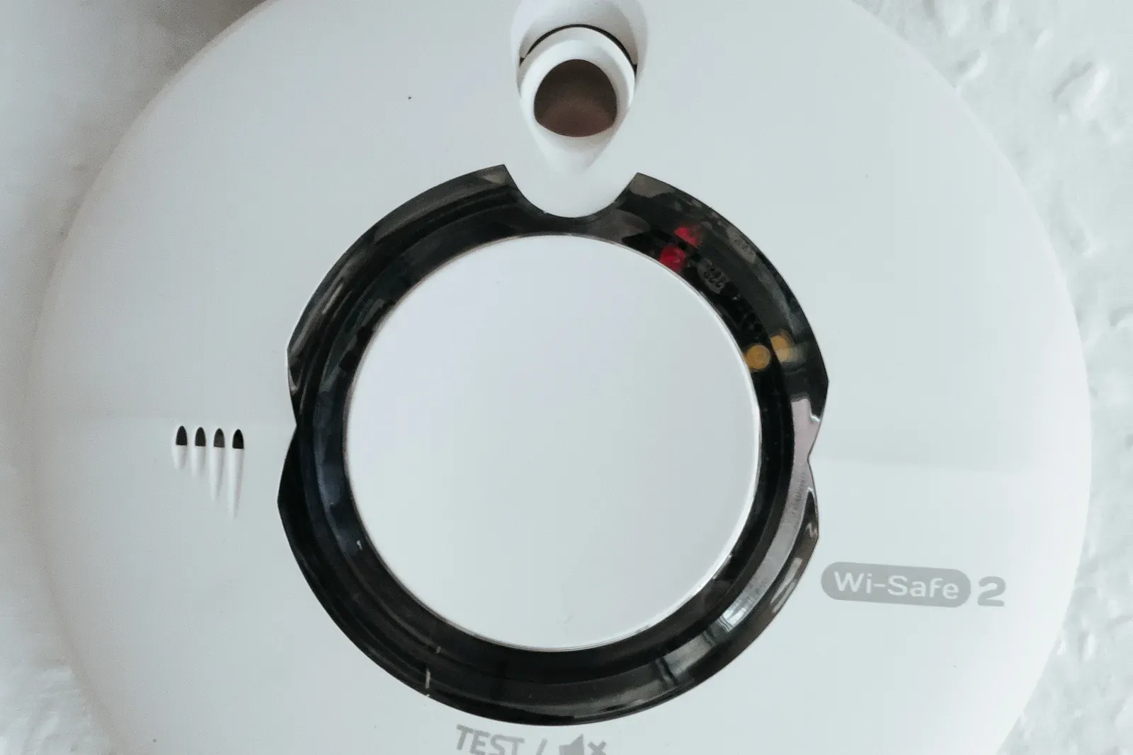 Sealed-battery smoke alarm close up